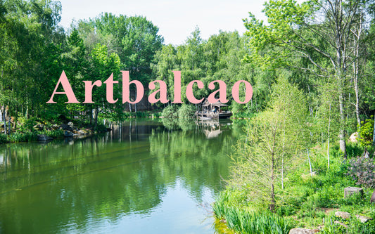 "Timeless Lakeside Charm: A Rustic Wooden Haven Nestled in Emerald Greenery"