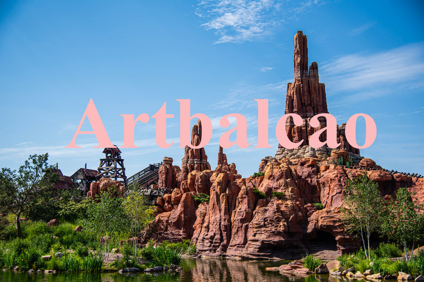 "Crimson Majesty: Awe-Inspiring Red Stone Mountain Under a Blue Sky"